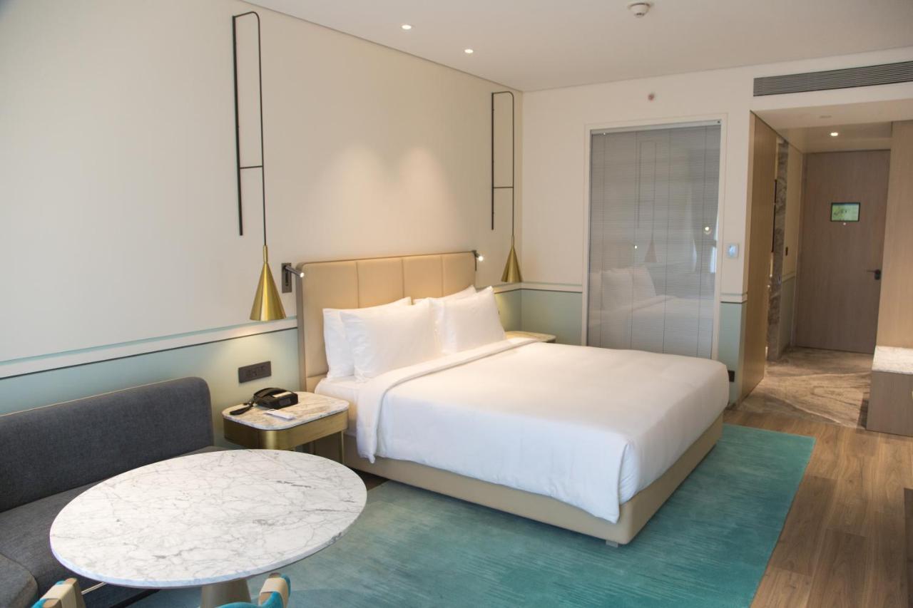Hotel Radisson Blu Mumbai International Airport Exterior foto A room at the hotel